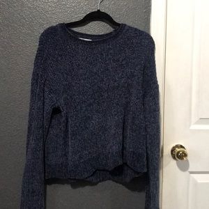 Knitted sweater.